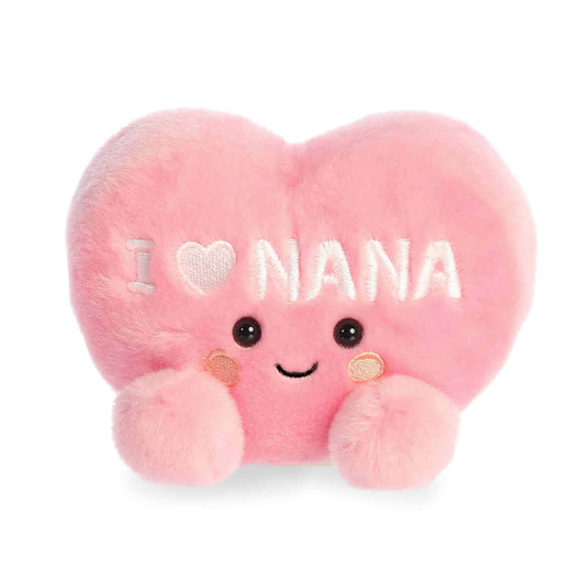 Product view of Palm Pals I Love Nana Heart, a pink plush heart with the text "I [Heart] NANA" embroidered in white on the front.