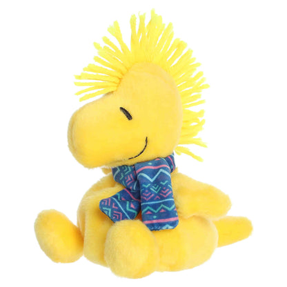 Palm Pals I Love Snow Woodstock plush featuring bright yellow fur, a feathery head crest, and a blue and pink patterned winter scarf.