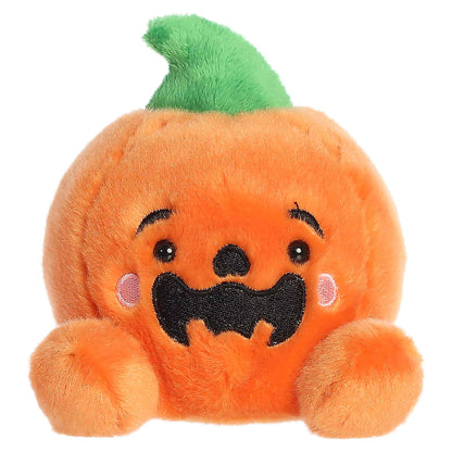 Palm Pals Jackson O' Lantern 4-inch plush pumpkin with an embroidered jack-o'-lantern smile, pink cheeks, and a green stem.
