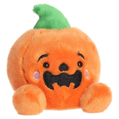 Palm Pals Jackson O' Lantern 4-inch plush pumpkin with an embroidered jack-o'-lantern smile, pink cheeks, and a green stem.