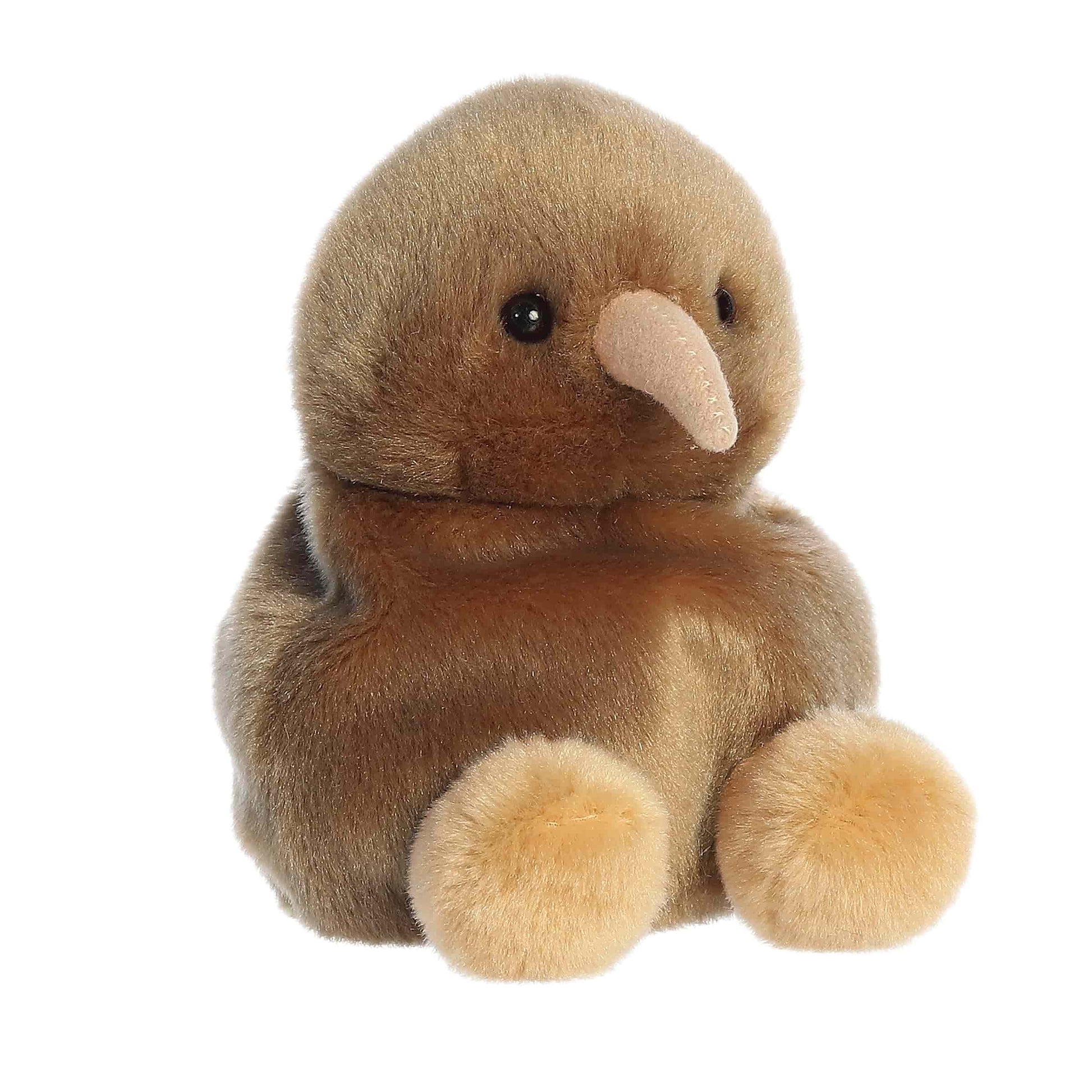 A product photo of the Palm Pals Kiri Kiwi 5-Inch Plush, a round brown stuffed kiwi bird with a long beige beak and feet, sitting on a white background.