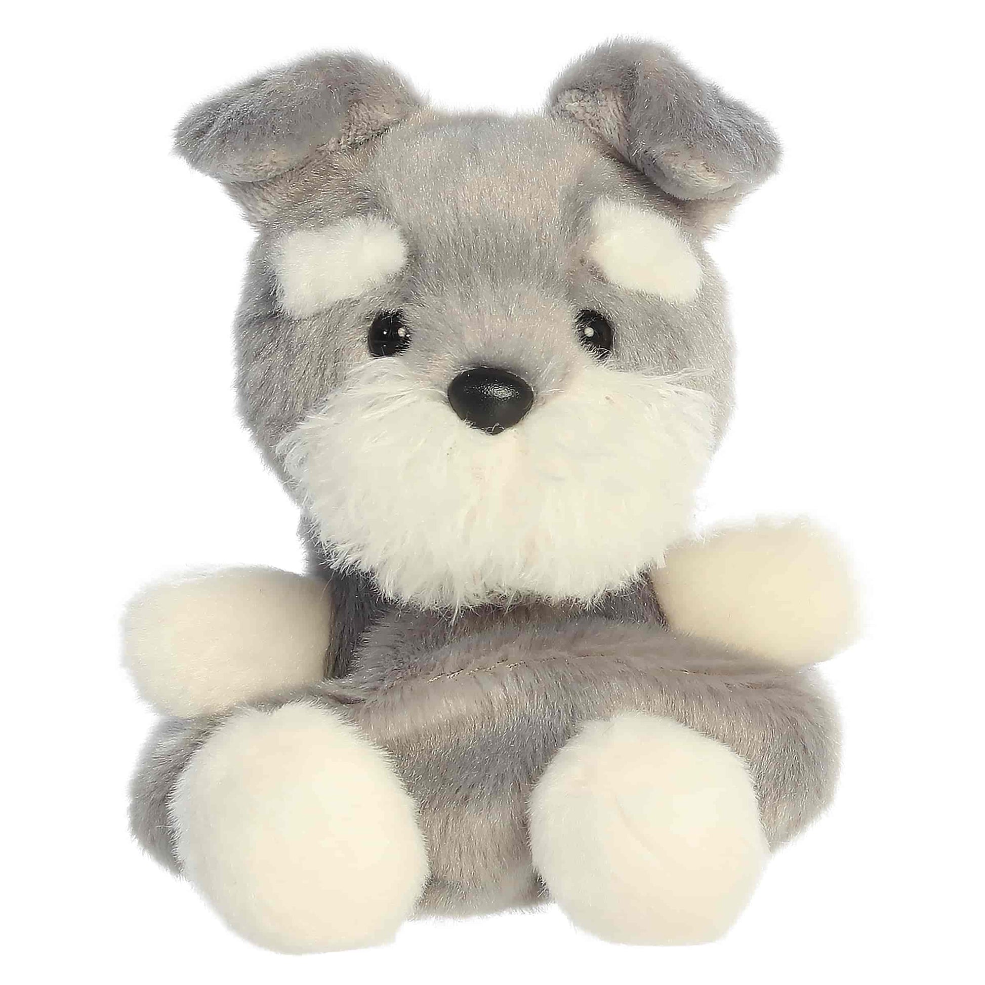 Palm Pals Korra Schnauzer, a small gray and white plush dog with a fluffy muzzle and tiny folded ears.