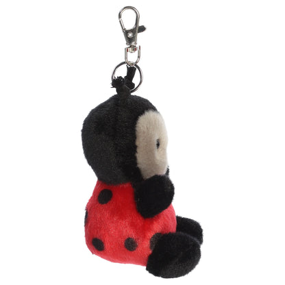 Palm Pals Lil Spots Ladybug mini plush clip-on featuring a bright red spotted shell, soft grey face, black antennae, and a metal clasp.