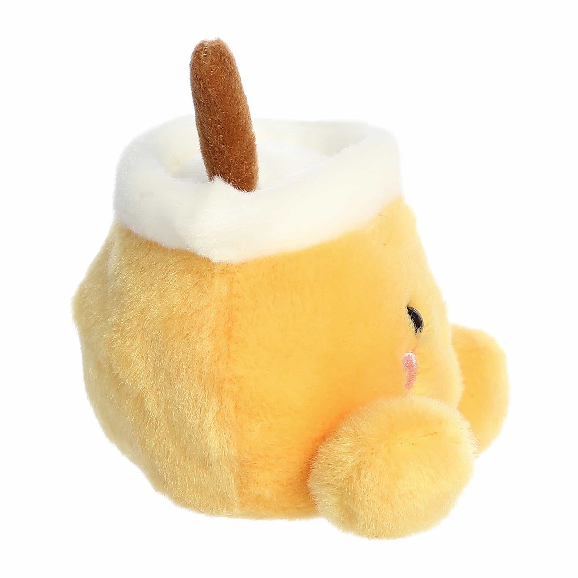 Palm Pals Mac Apple Cider 5-inch plush featuring a golden-yellow mug, plush cinnamon stick stick-out top, white rim, and rosy cheeks.