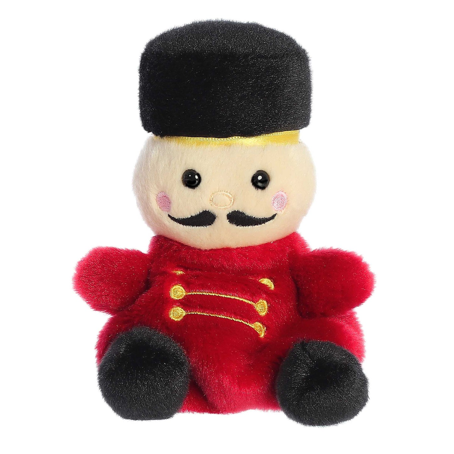 Palm Pals Marius Nutcracker plush featuring a red uniform with gold details, black boots, a black mustache, and a tall black fur hat.
