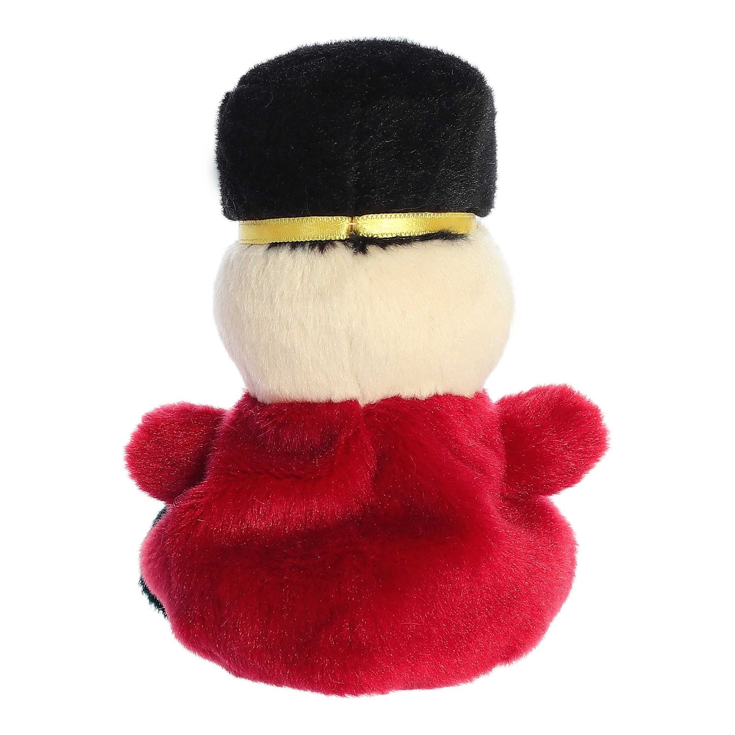 Palm Pals Marius Nutcracker plush featuring a red uniform with gold details, black boots, a black mustache, and a tall black fur hat.