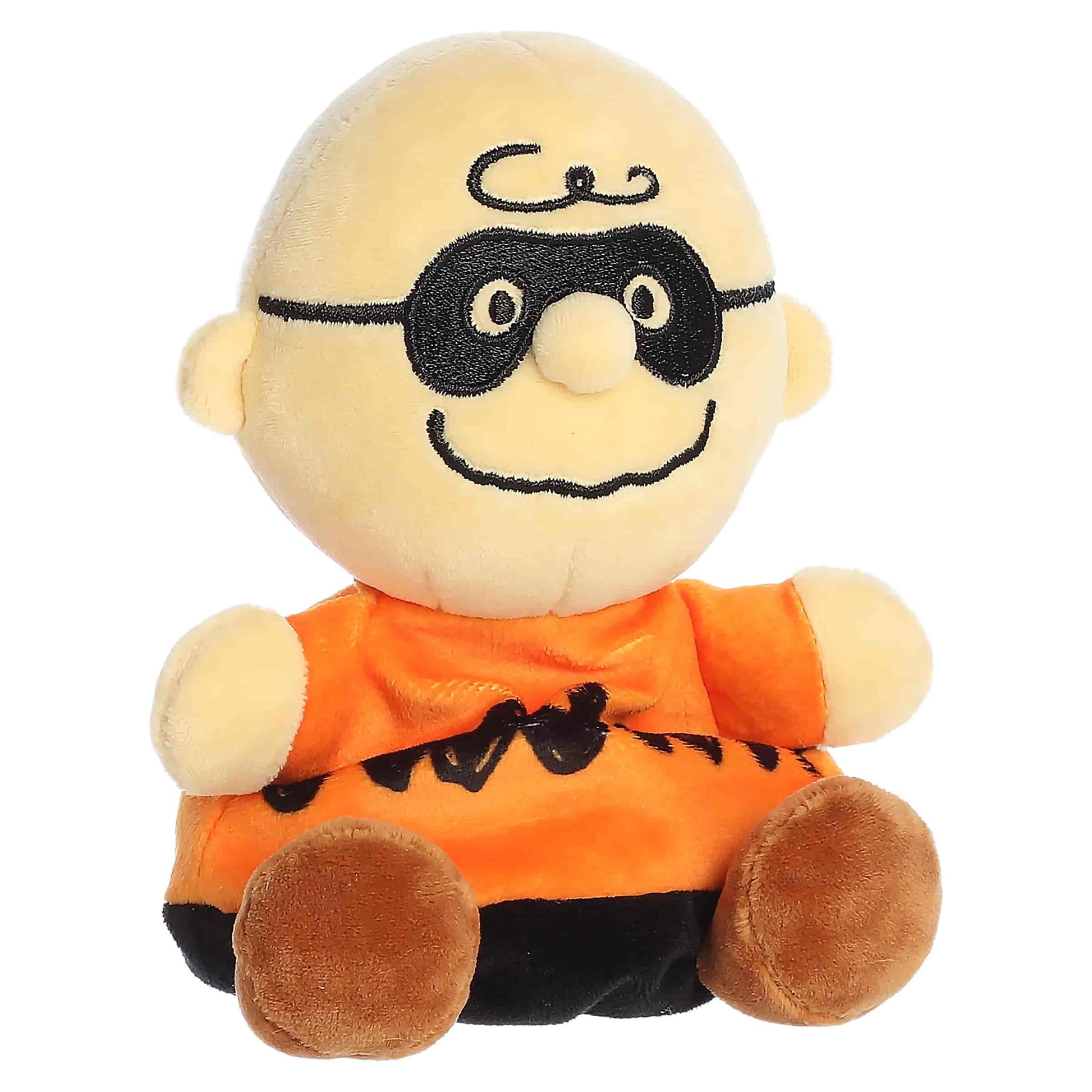 Palm Pals Masked Charlie Brown plush featuring an orange zig-zag shirt, black stitched domino eye mask, and brown shoes.