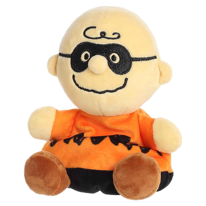 Palm Pals Masked Charlie Brown plush featuring an orange zig-zag shirt, black stitched domino eye mask, and brown shoes.