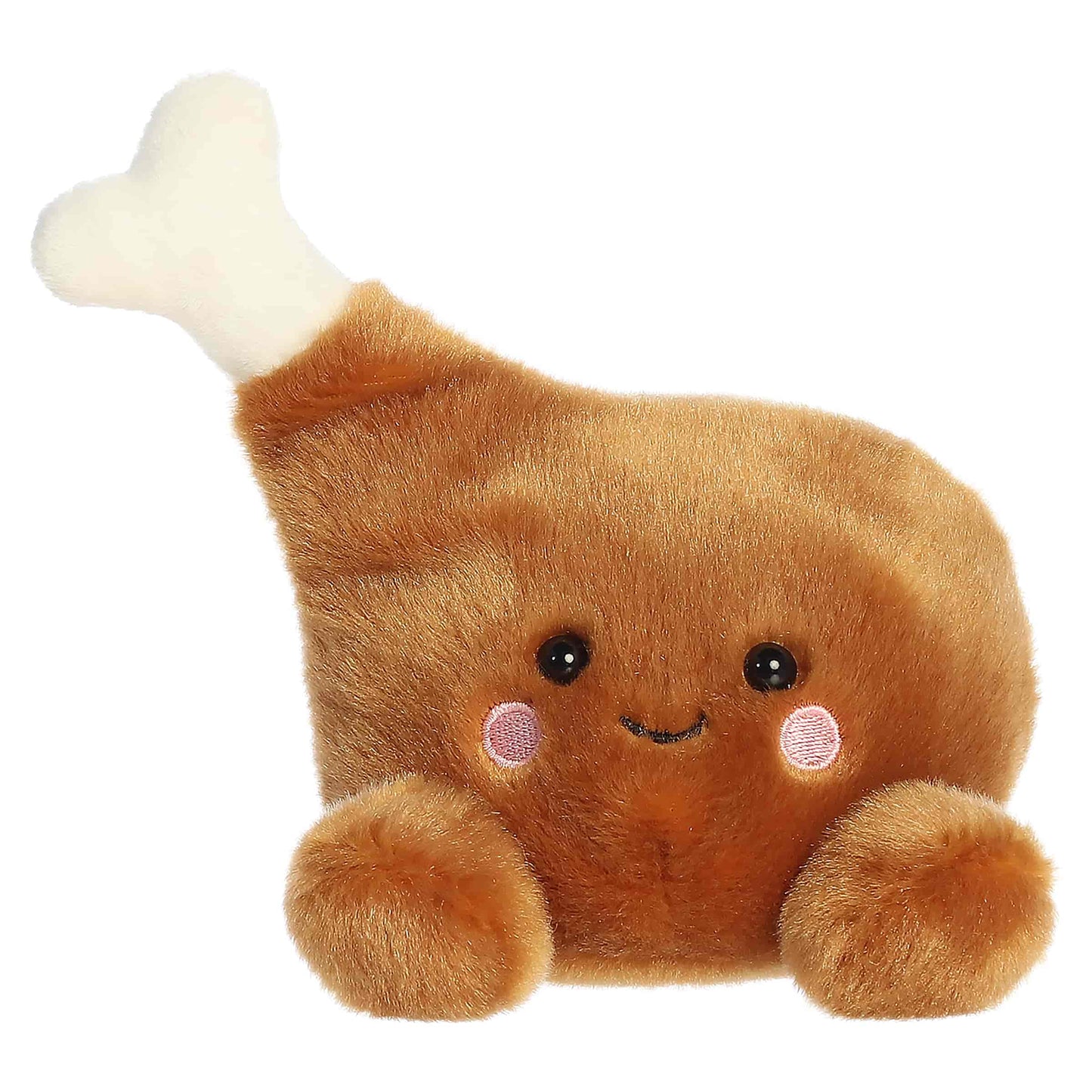 Palm Pals Mila Drumstick 6-inch golden-brown plush drumstick with a cream plush bone, embroidered smile, and rosy cheeks.