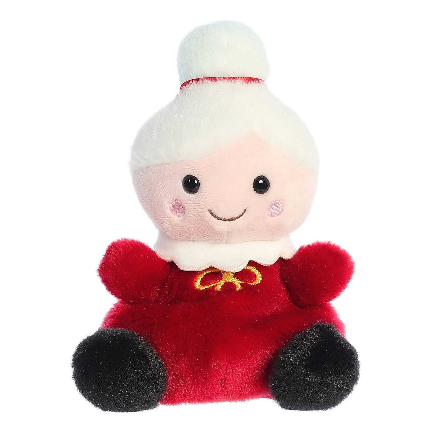 Palm Pals Mrs. Claus plush wearing a red dress with a white collar, gold ribbon accent, and snowy white hair tied in a bun with a red bow.