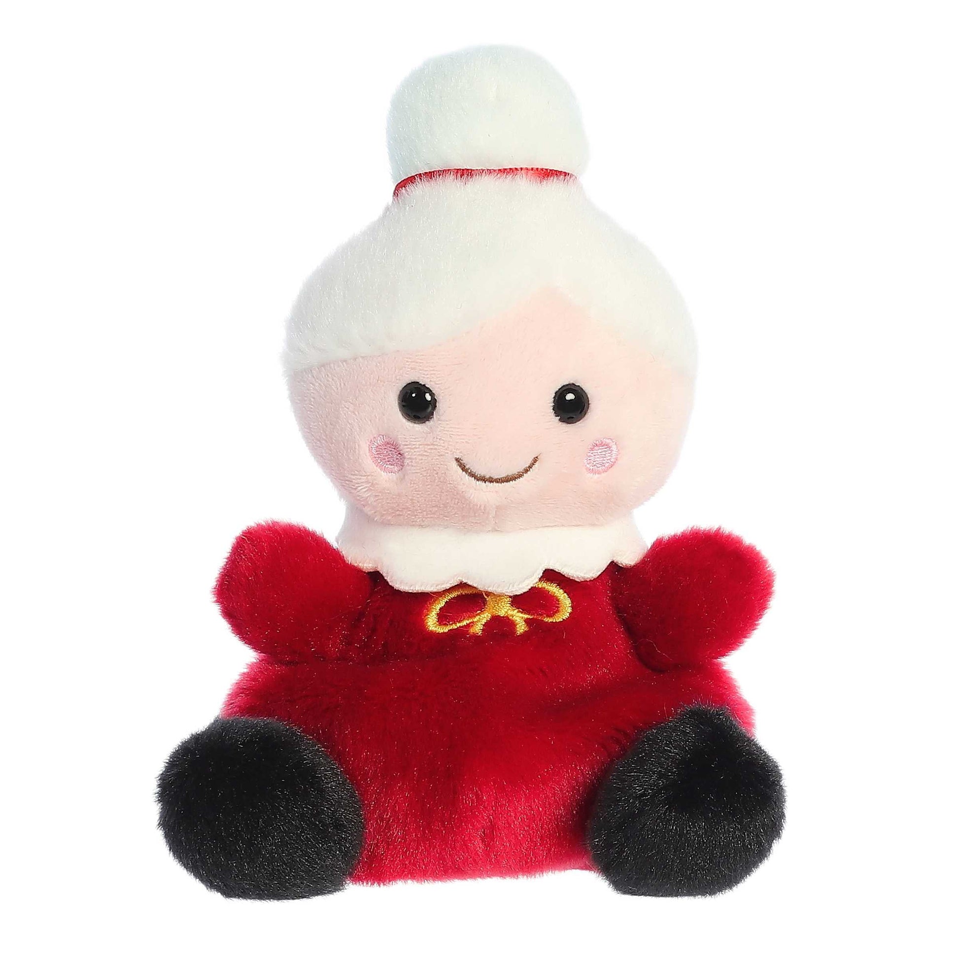 Palm Pals Mrs. Claus plush wearing a red dress with a white collar, gold ribbon accent, and snowy white hair tied in a bun with a red bow.