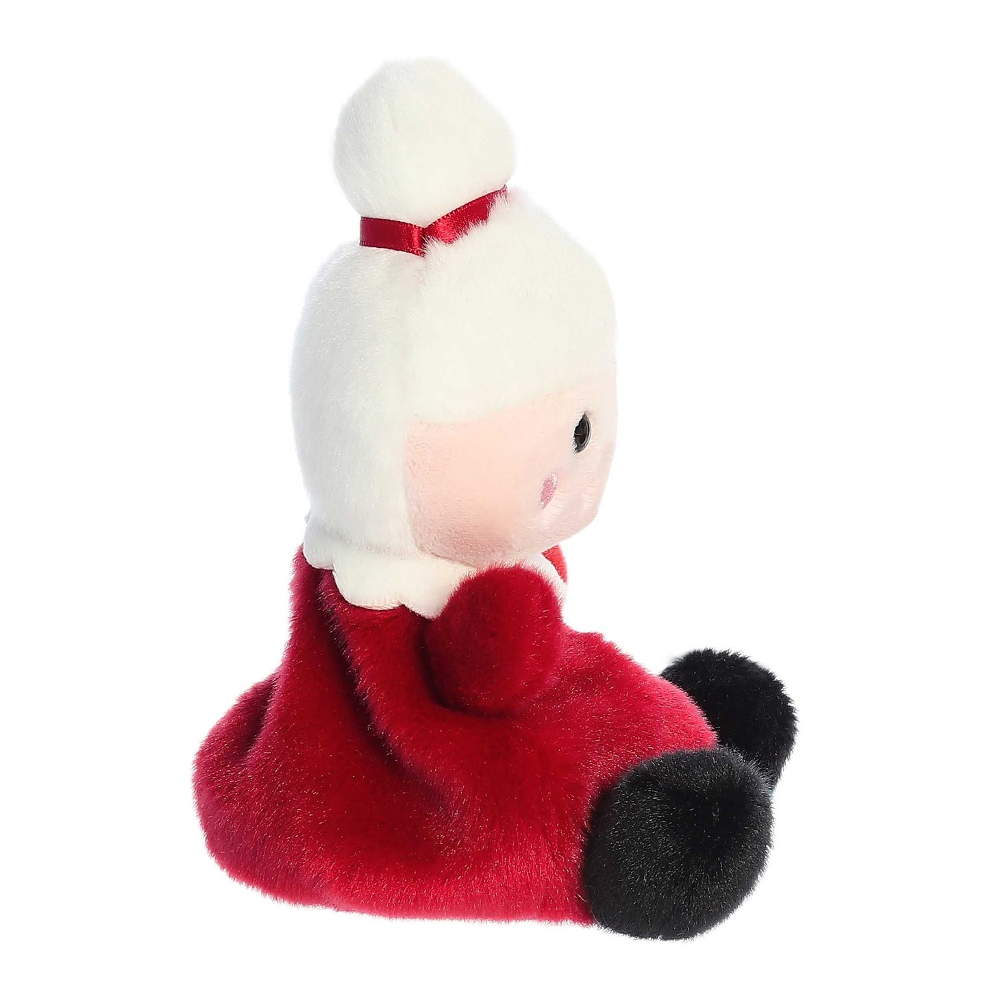 Palm Pals Mrs. Claus plush wearing a red dress with a white collar, gold ribbon accent, and snowy white hair tied in a bun with a red bow.