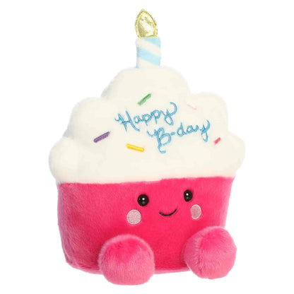 Palm Pals Party-Sized Sparkle Birthday Cupcake plush featuring a bright pink base, white frosting, embroidered sprinkles, and a birthday candle.