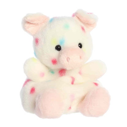 Angled view of Palm Pals Patsy Funfetti Pig Plush