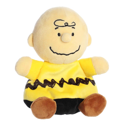 Palm Pals Peanuts Charlie Brown 5-inch plush, wearing his signature yellow zig-zag shirt.