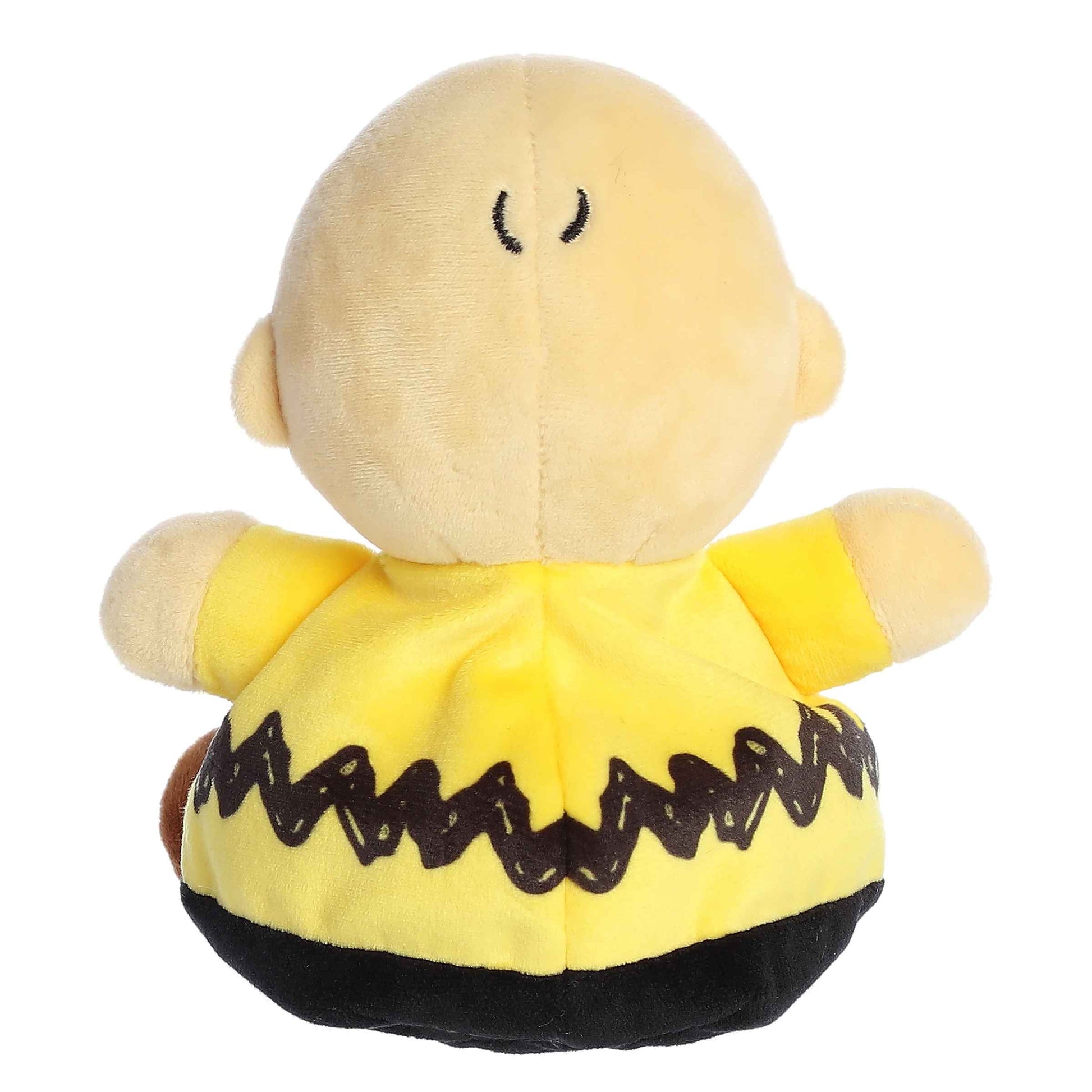 Palm Pals Peanuts Charlie Brown 5-inch plush, wearing his signature yellow zig-zag shirt.