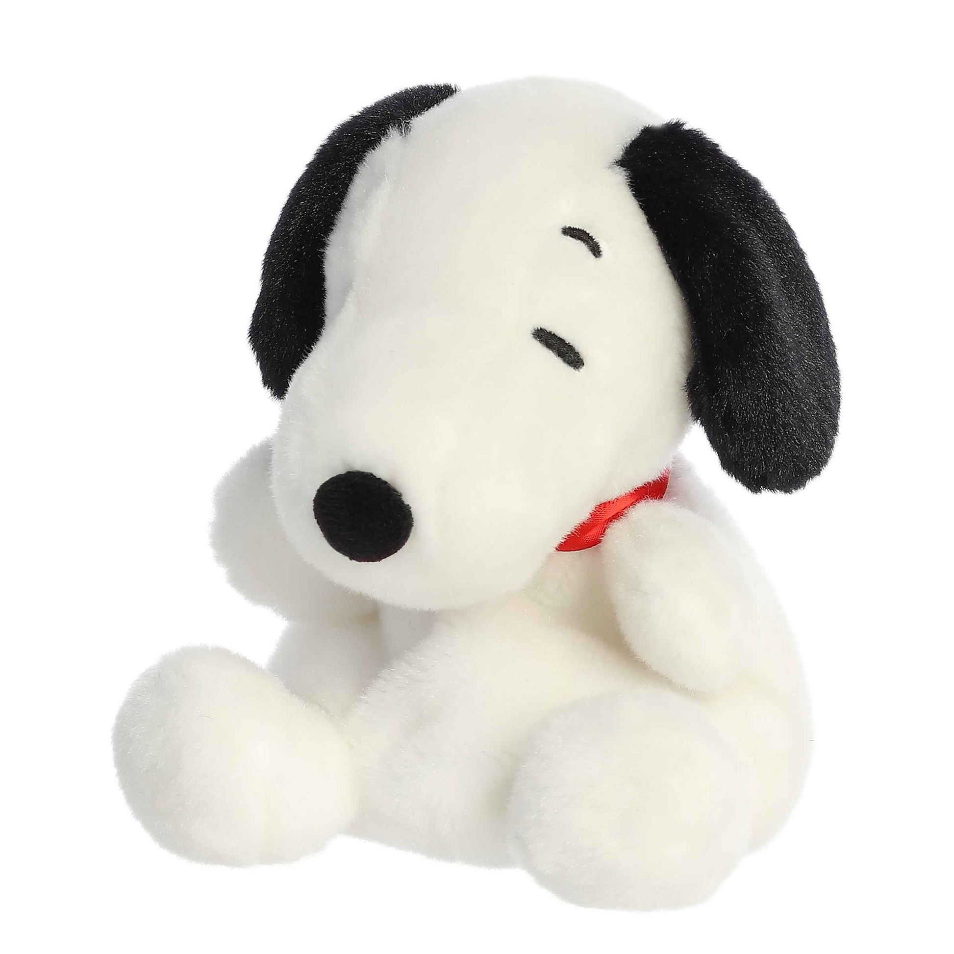 Angled view of Palm Pals Peanuts Snoopy 5-inch plush soft toy