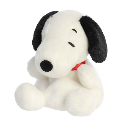 Angled view of Palm Pals Peanuts Snoopy 5-inch plush soft toy