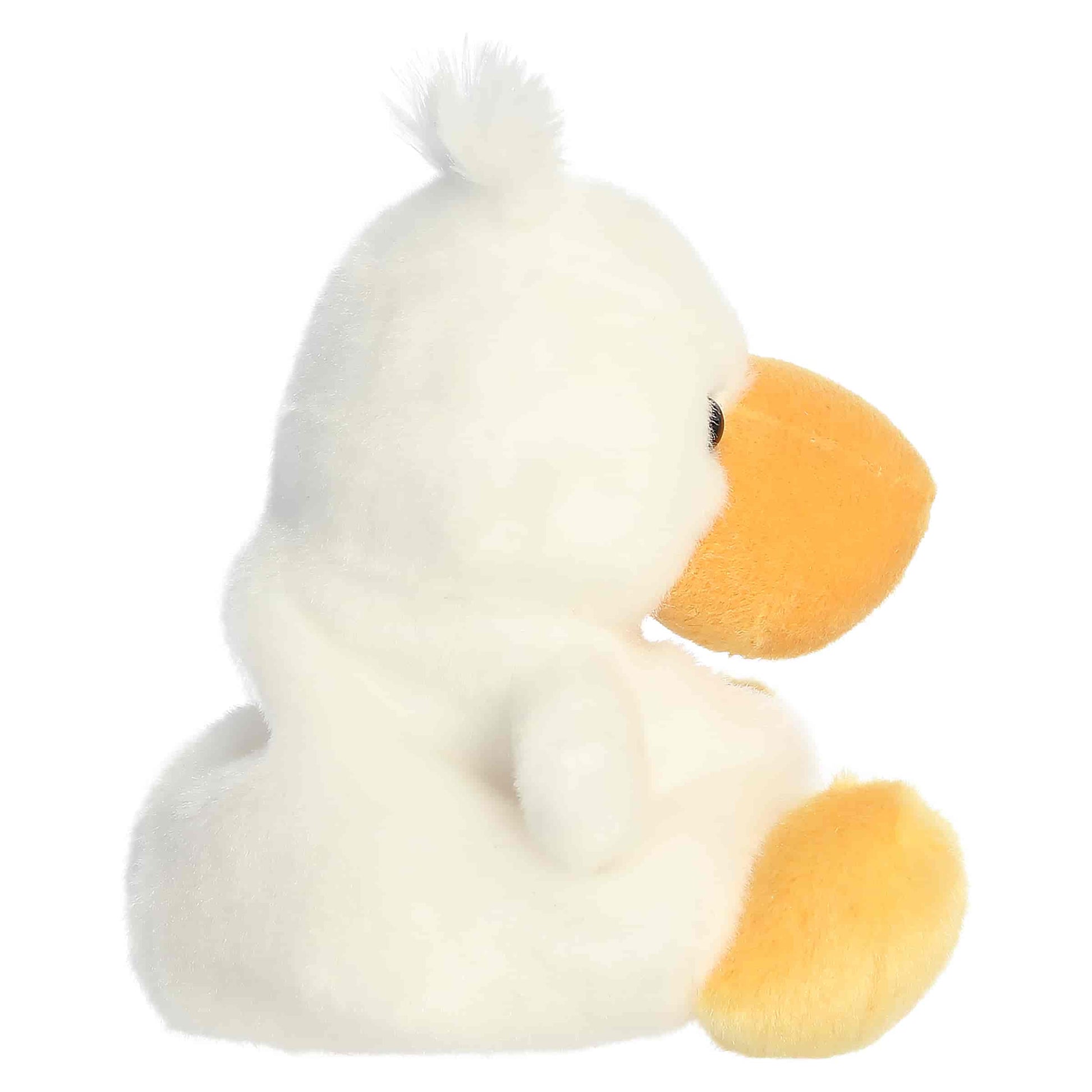Palm Pals Percy Pelican plush featuring a soft white body, bright yellow beak, and a fuzzy tuft of hair on his head.