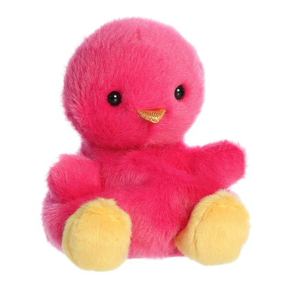 Pink plush duck with yellow feet on a white background