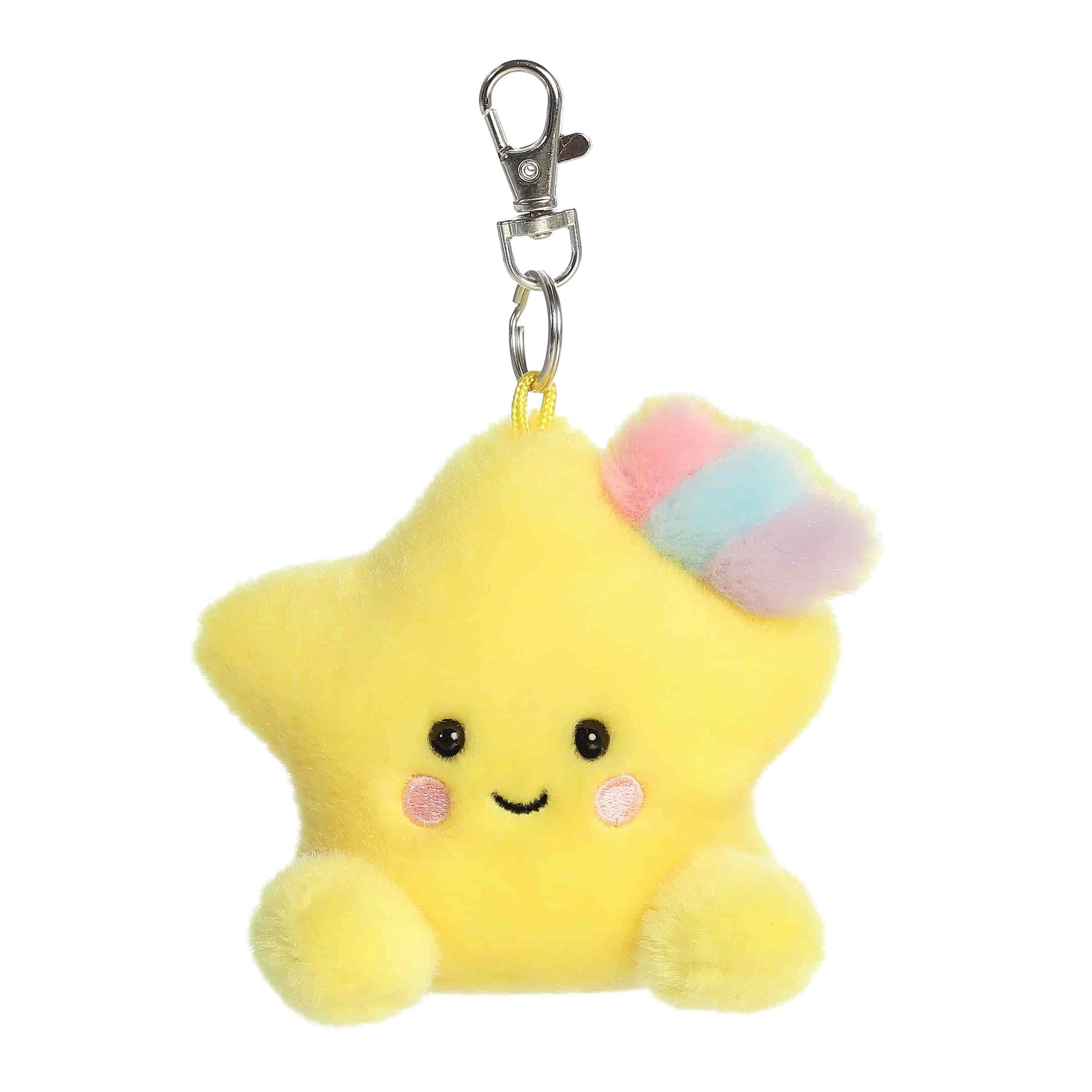 Palm Pals Pisces Star 4-inch clip-on plush soft toy, a yellow star with a pastel rainbow accent attached to a clip.