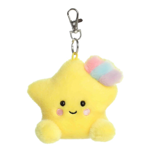 Palm Pals Pisces Star 4-inch clip-on plush soft toy, a yellow star with a pastel rainbow accent attached to a clip.