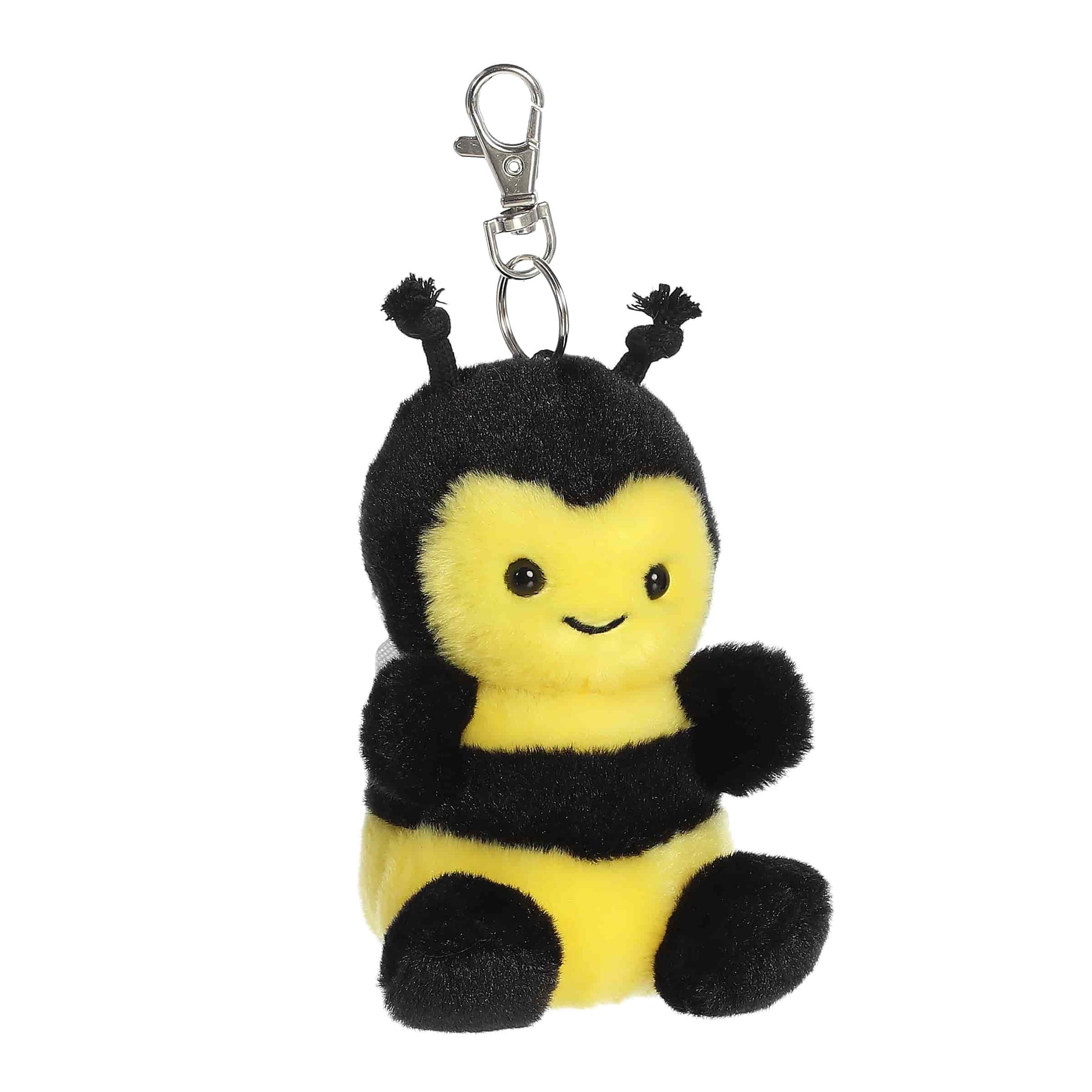 Angled view of Palm Pals Queeny Bee, a 4-inch black and yellow plush clip.