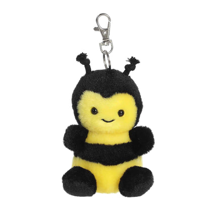 Product view of Palm Pals Queeny Bee, a 4-inch black and yellow plush bee with knotted antennae and a plastic keychain clip.