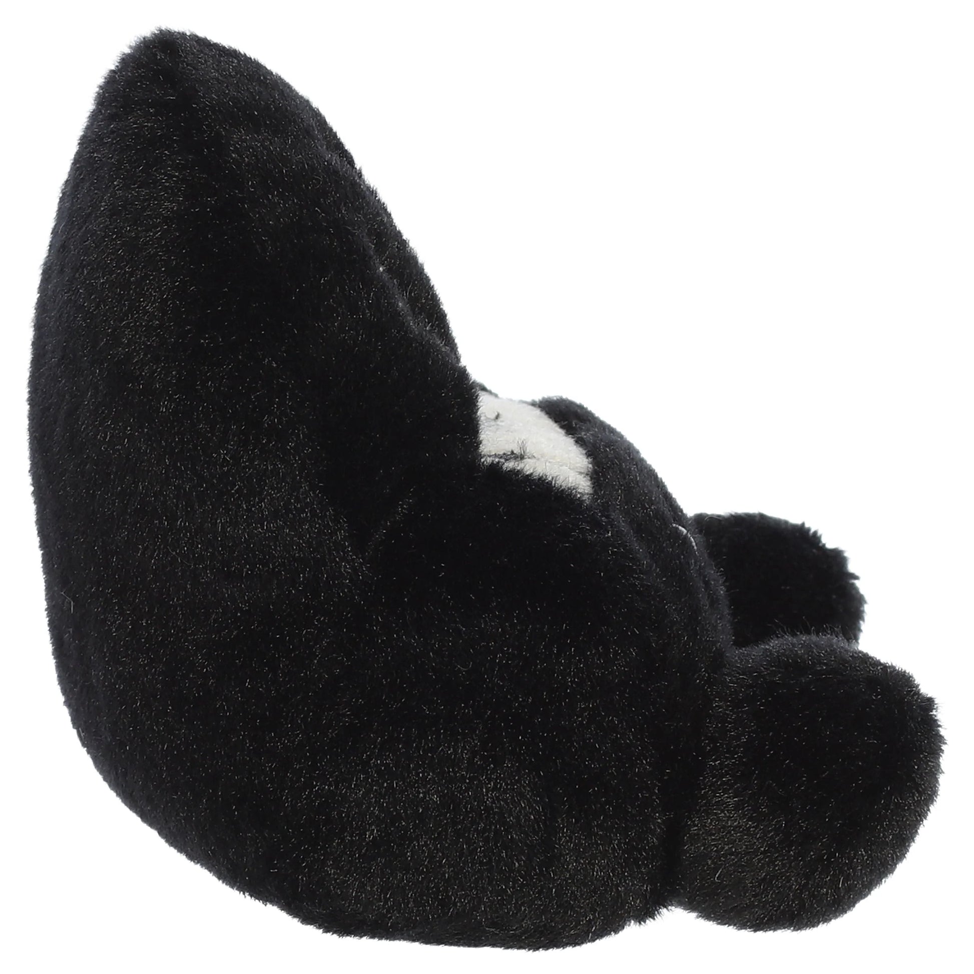 Palm Pals Ragtime Piano plush toy in black with embroidered piano keys, white musical notes, a cute smiling face, and pink blush.