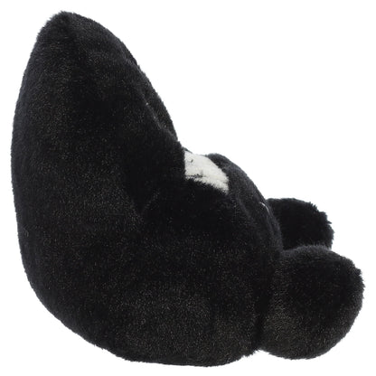 Palm Pals Ragtime Piano plush toy in black with embroidered piano keys, white musical notes, a cute smiling face, and pink blush.
