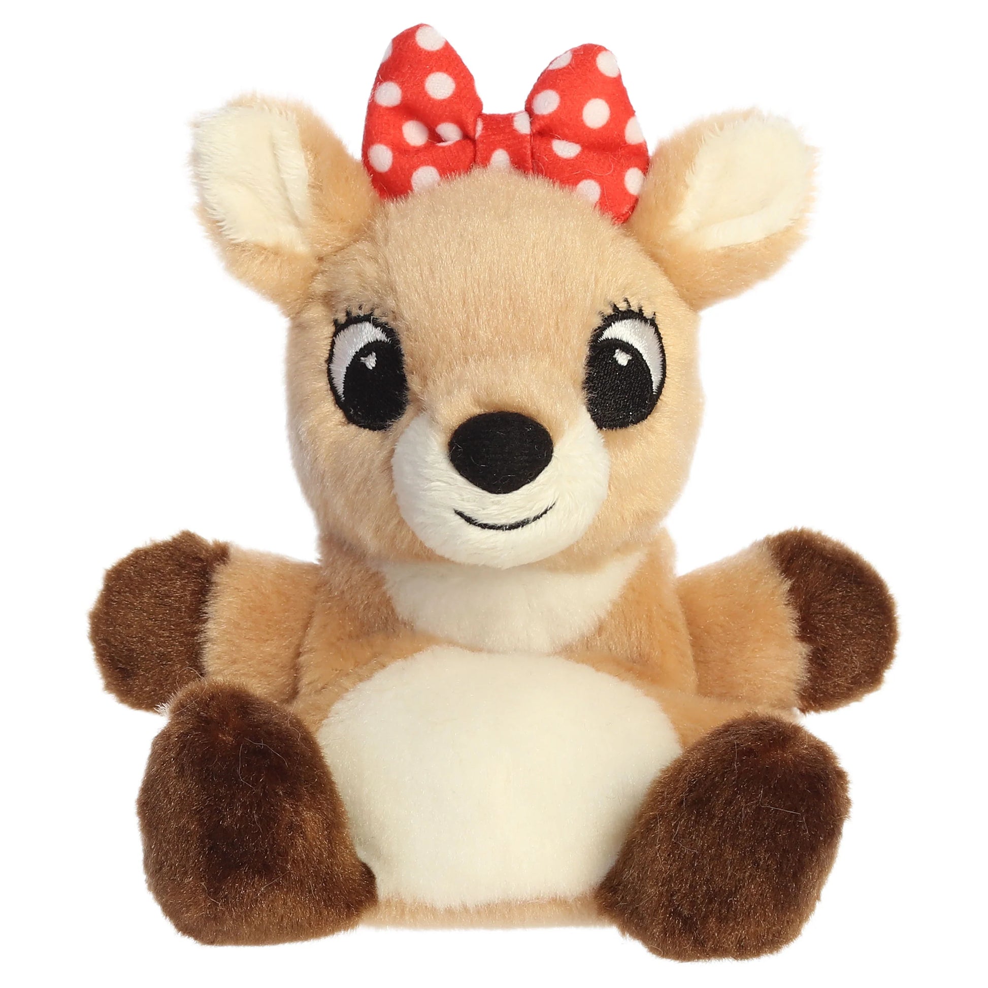 Palm Pals Clarice character plush toy from Rudolph the Red-Nosed Reindeer sitting down with a red polka dot bow.