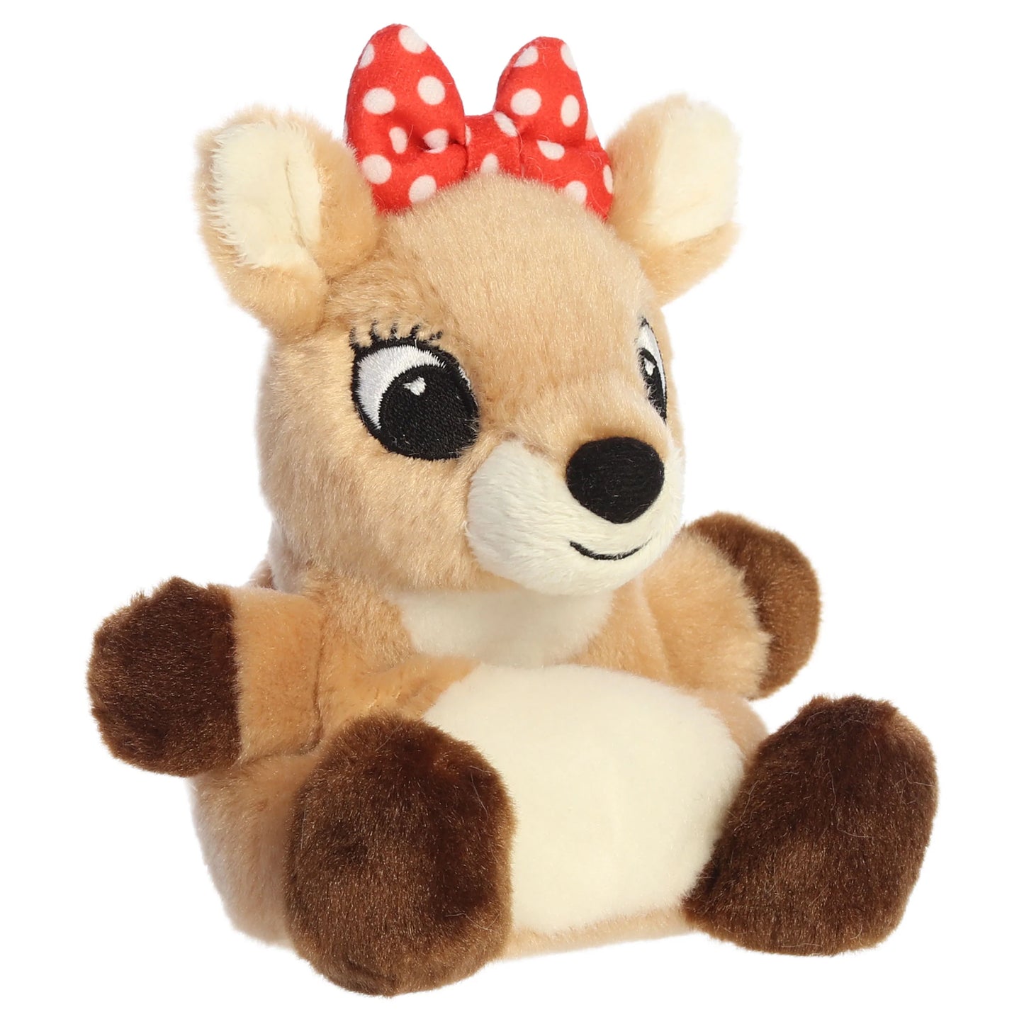 Palm Pals Clarice character plush toy from Rudolph the Red-Nosed Reindeer sitting down with a red polka dot bow.