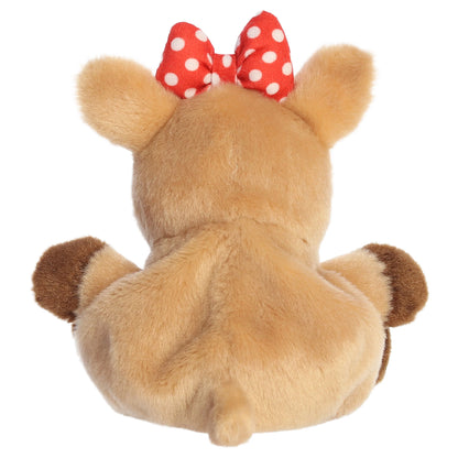 Palm Pals Clarice character plush toy from Rudolph the Red-Nosed Reindeer sitting down with a red polka dot bow.