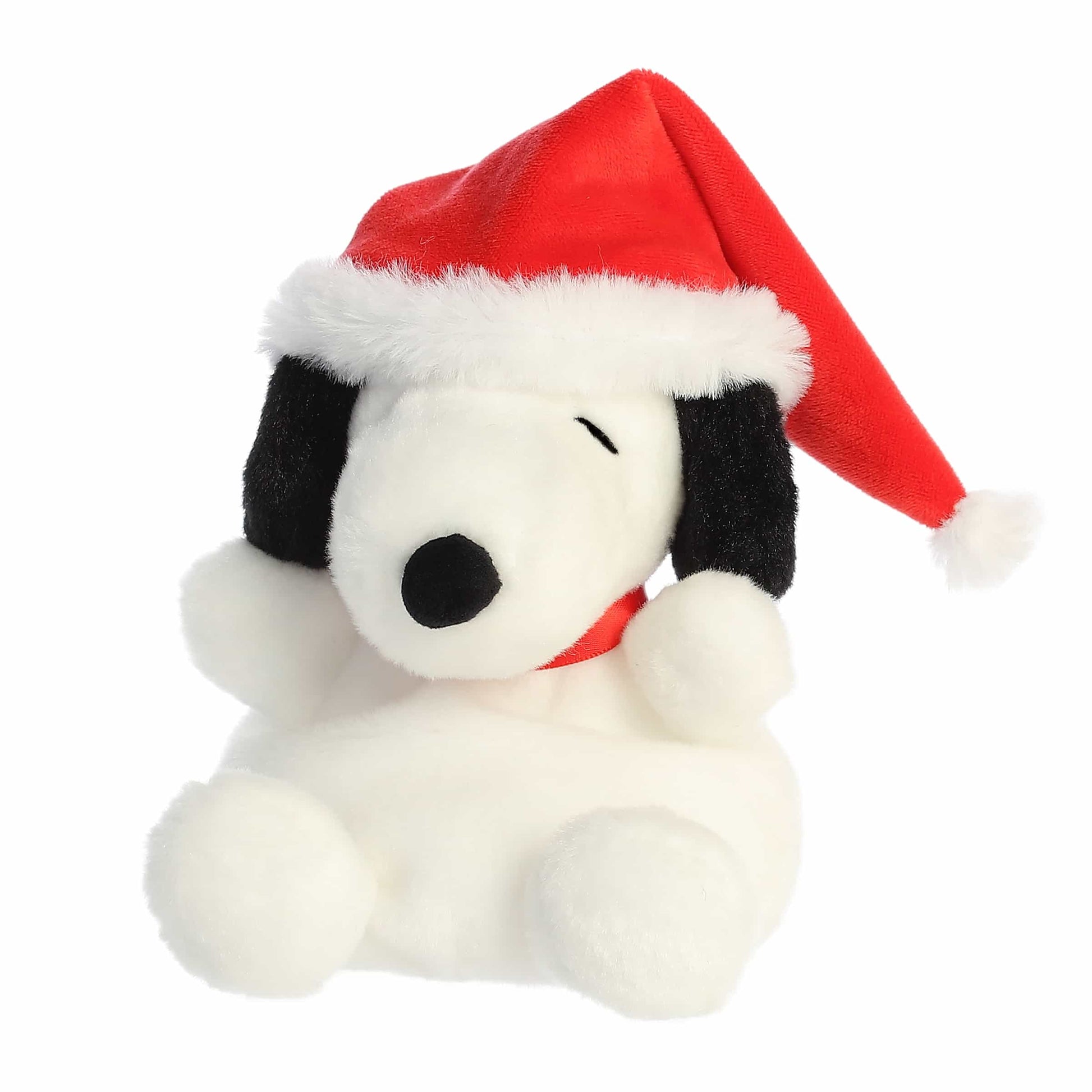 Palm Pals Santa Snoopy plush wearing a red Santa hat with plush white trim, a white pom-pom, and a red collar.