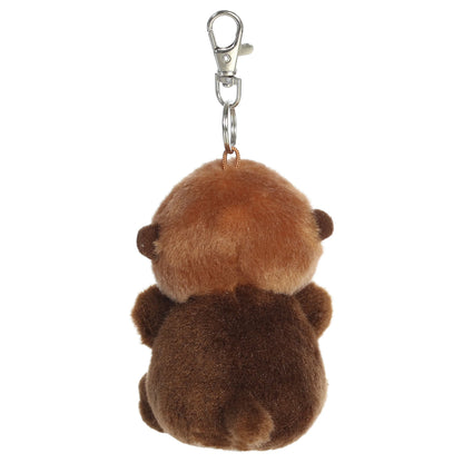 Palm Pals Selena Sea Otter mini plush clip-on featuring soft cocoa brown and cream fur with a silver metal clasp.