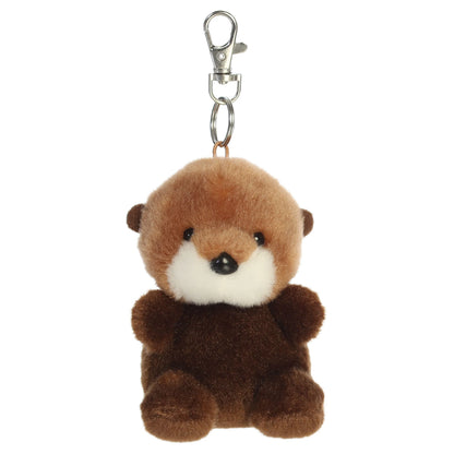 Palm Pals Selena Sea Otter mini plush clip-on featuring soft cocoa brown and cream fur with a silver metal clasp.