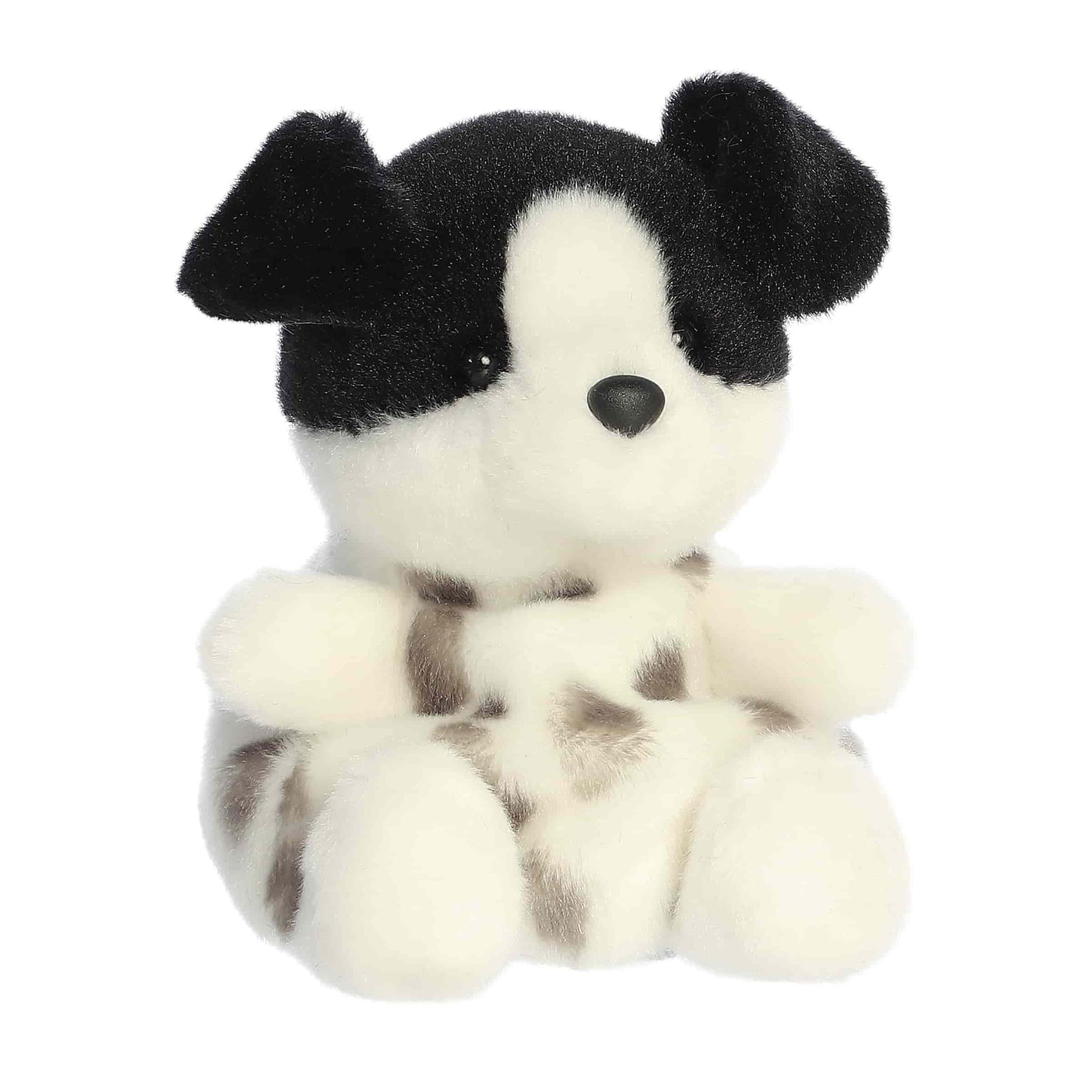 Angled view of Palm Pals Snorkles Black and White Dog Plush