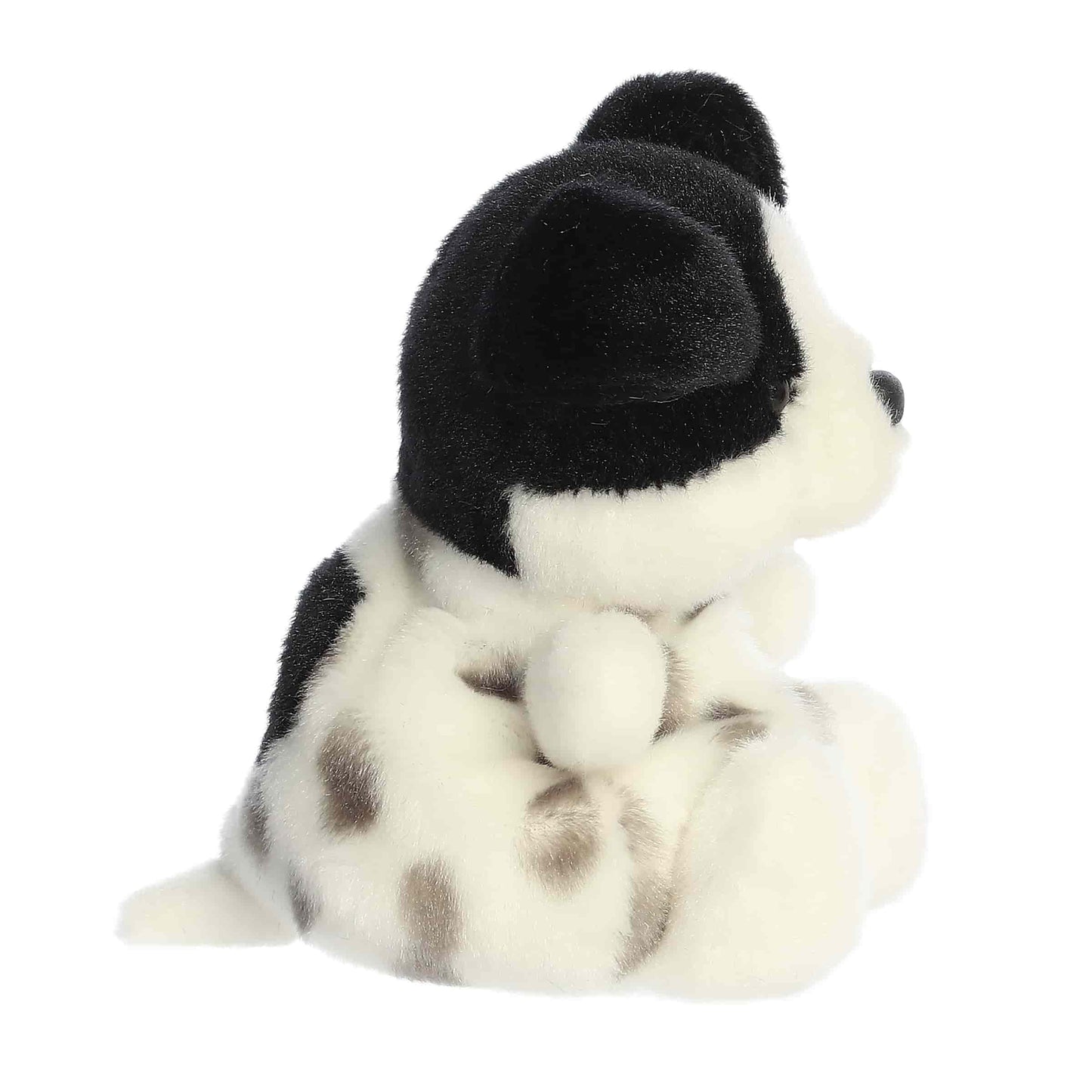 Side view view of Palm Pals Snorkles Black and White Dog Plush