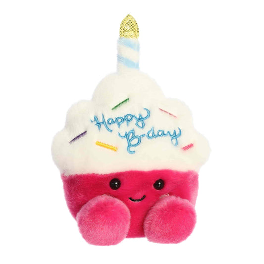Angled view of Palm Pals Sparkle Birthday Cupcake 5-inch plush soft toy