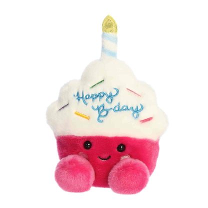 Angled view of Palm Pals Sparkle Birthday Cupcake 5-inch plush soft toy