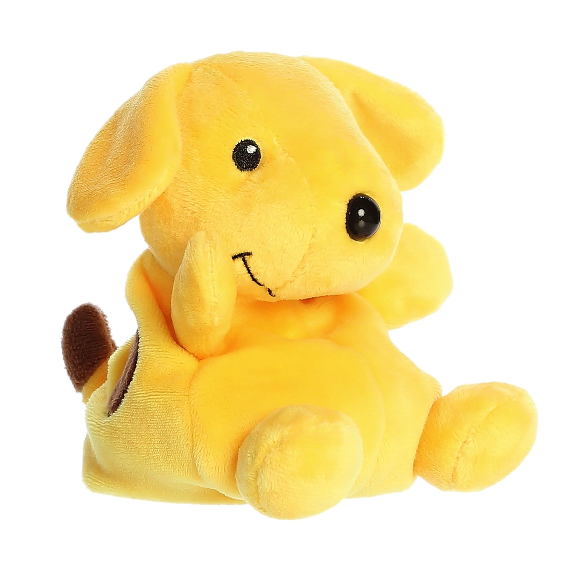 Angled view of Palm Pals Spot 5-inch plush soft toy
