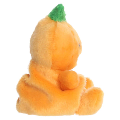 Palm Pals Squashley Pumpkin Head 5-inch orange plush pumpkin sitting upright with an embroidered jack-o'-lantern smile and green stem.
