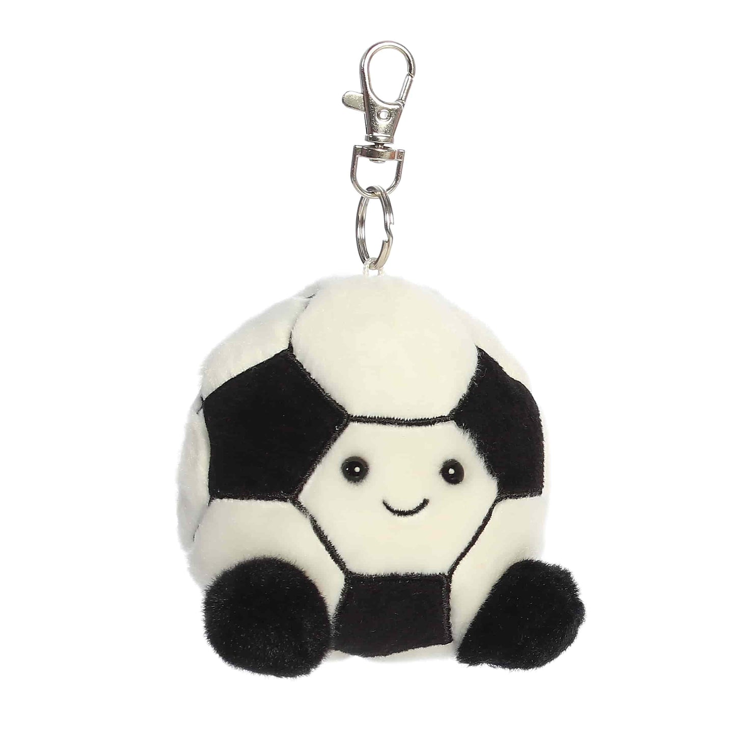 Plush soccer ball keychain with a smiling face on a white background