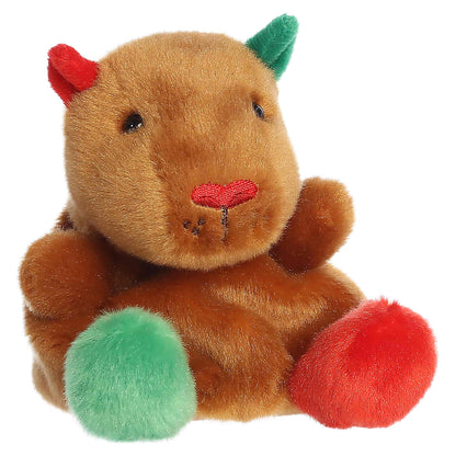 Palm Pals Syd Holiday Capybara 4-inch brown plush with red and green ears, red and green feet, and an embroidered red nose.