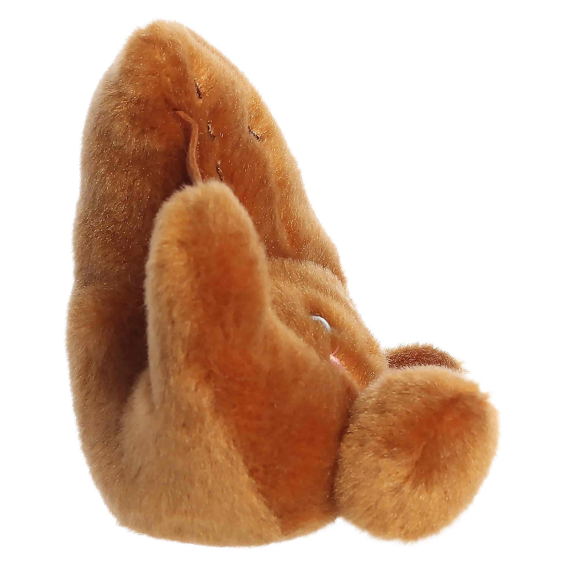 Palm Pals Tag Baseball Glove, a small golden-brown plush shaped like a baseball glove with stitched detailing and a sweet smiling face.