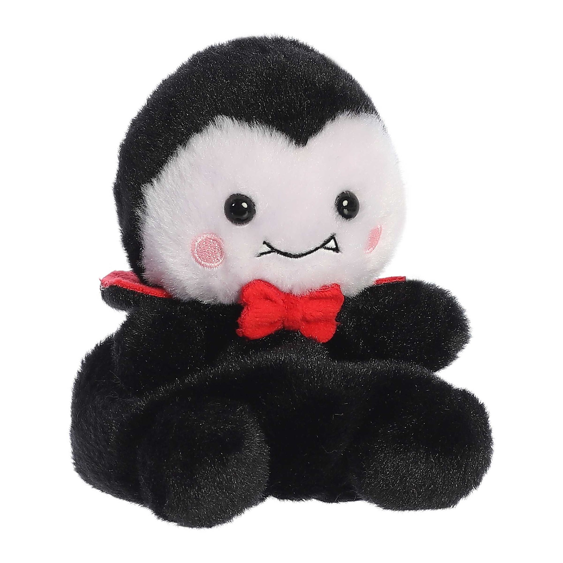 Palm Pals Viktor Vampire 5-inch plush featuring soft black and white fur, a red bow tie, red cape collar, and tiny embroidered fangs.