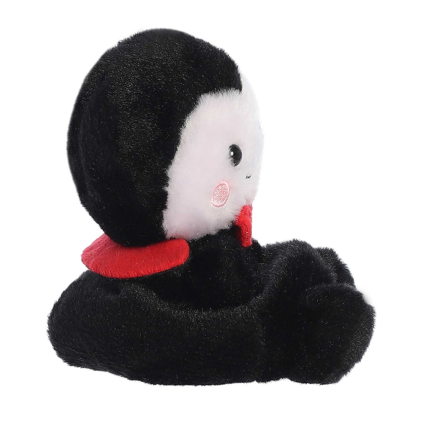 Palm Pals Viktor Vampire 5-inch plush featuring soft black and white fur, a red bow tie, red cape collar, and tiny embroidered fangs.