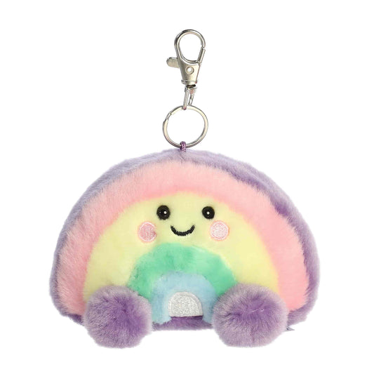 Palm Pals Vivi Rainbow 4-inch clip-on plush soft toy, a pastel rainbow with a happy face attached to a clip.