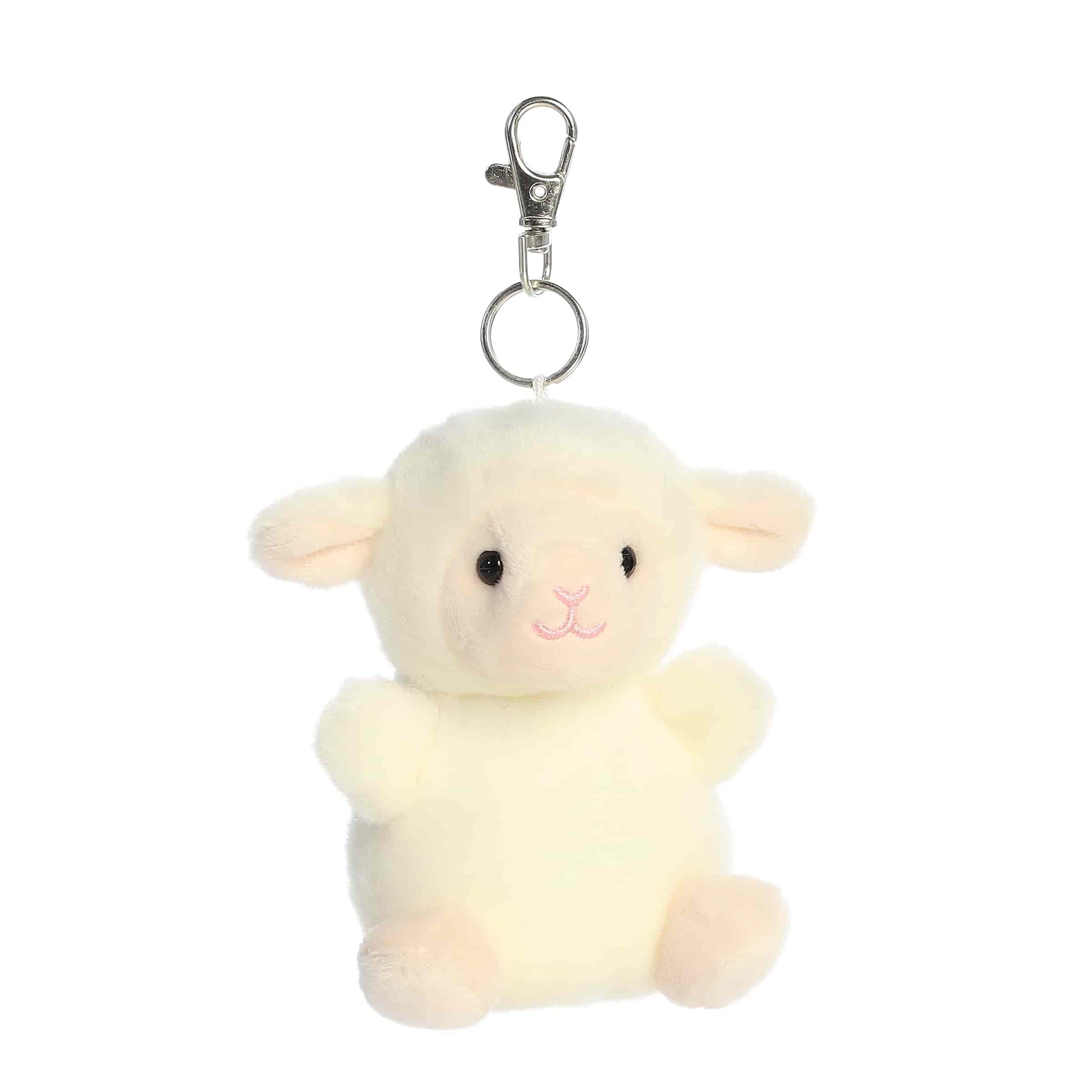 Angled view of Palm Pals Woolly Lamb, a 4-inch white plush clip.
