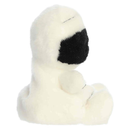 Palm Pals Wraphael Mummy 4-inch white plush wrapped in bandages with a black embroidered face section, white eyes, and pink cheeks.